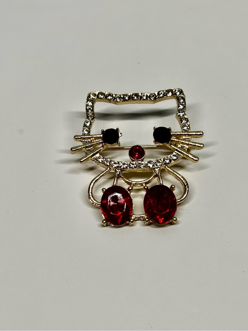 Gold-Tone Red Crystal Cat Brooch - Elegant Women's Jewelry